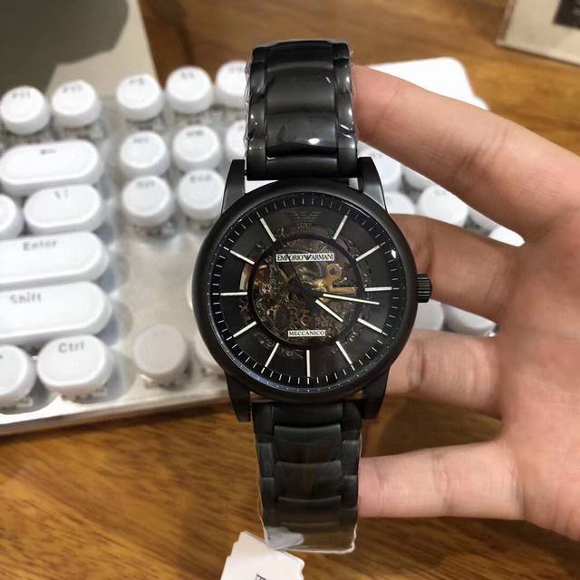 Armani watch men's watch ar60008 is uniquely crafted with black steel, cool and trendy hollow design, rich in modern artistic beauty, imported cowhide strap, needle buckle, mineral crystal mirror, fully automatic mechanical men's watch 42Mm * 13mm: