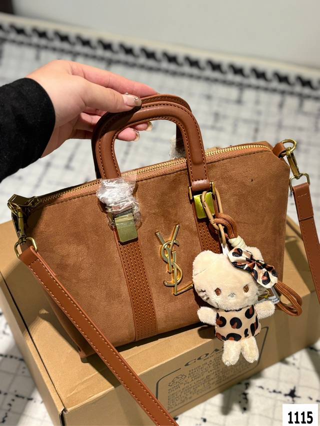 The Ysl handbag with accompanying box is a hot and stylish new item that looks great when you go out. Size 22 17