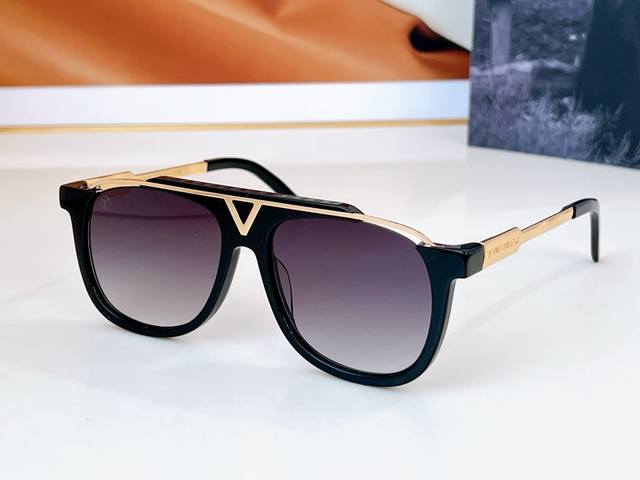 Louis Vuitton * Mod: Z0936E Size: 57 Ports 16-145