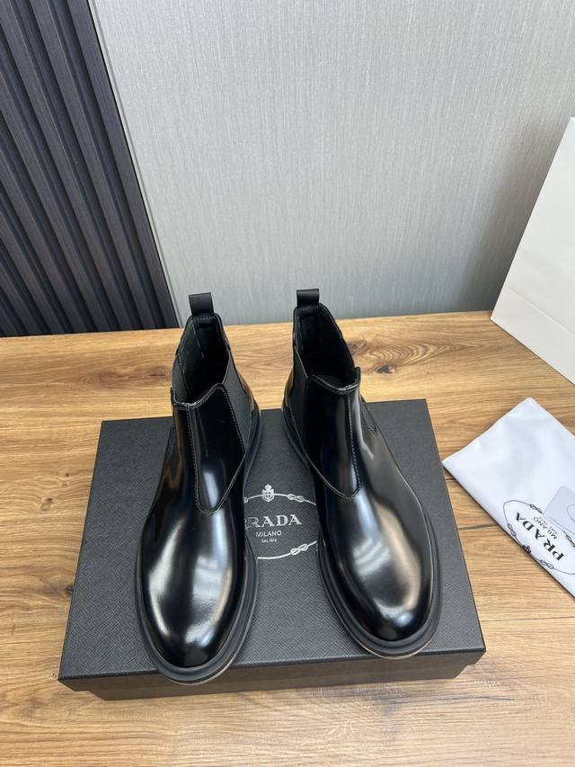 Factory price Prad * Prada pure original glossy leather air cushioned short boots for men Chelsea boots are made of imported open edge bead glossy leather, with geometric cutting, imported locomotive precision stitching and splicing, high-precision c